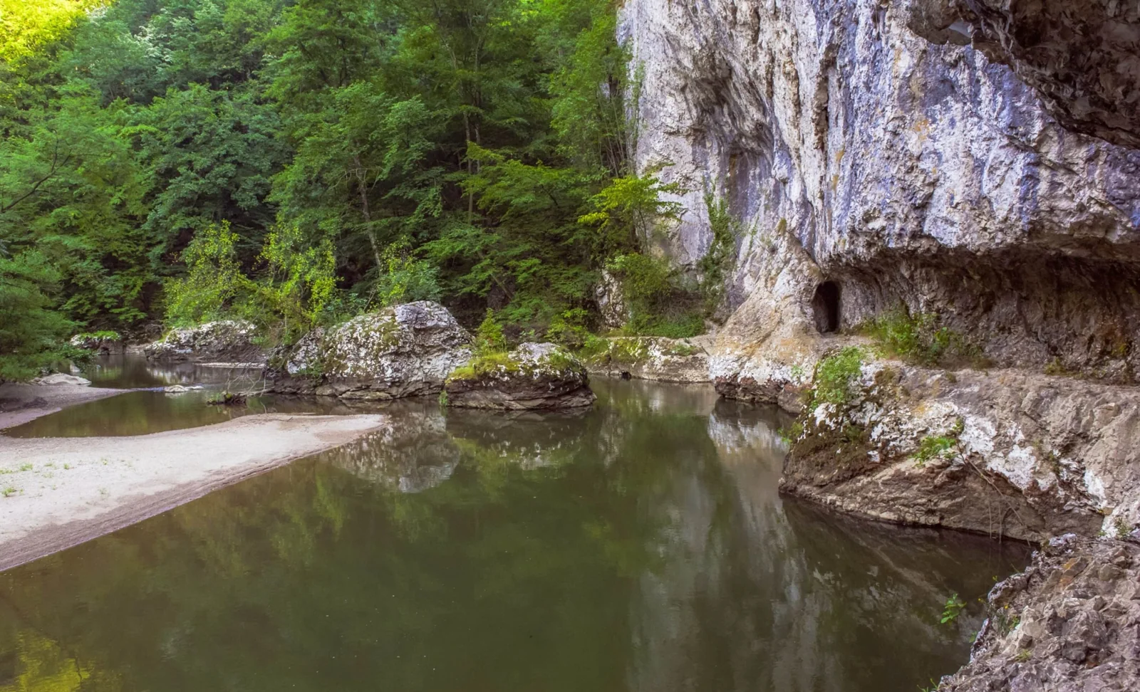 Nera Gorge river and rock cut passage beneath steep limestone cliffs